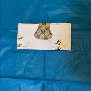 Gucci Off-White Monogram Continental Wallet with GG Tab